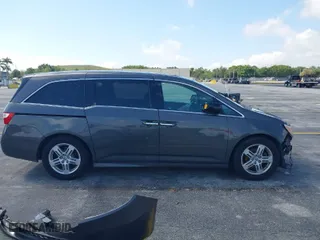 2012 Honda Odyssey Touring with VIN 5FNRL5H96CB087780, listed as a IAAI auction lot 41893409 with 1 mi miles. Bid and sale history available at carsss.com. Image 14.
