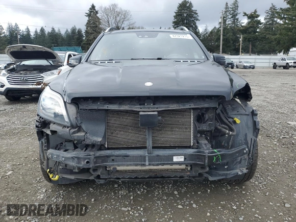 2015 Mercedes-Benz GL-Class GL 550 with VIN 4JGDF7DE5FA498354, listed as a Copart auction lot 47321215 with 100,702 mi miles and Salvage Title. Bid and sale history available at carsss.com. Image 5.