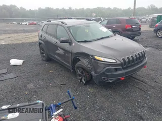 2016 Jeep Cherokee Trailhawk with VIN 1C4PJMBB6GW109894, listed as a IAAI auction lot 42519605 with 81,784 mi miles and . Bid and sale history available at DreamBid. Image 1.