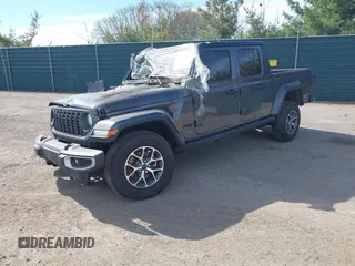 2024 Jeep Gladiator Willys with VIN 1C6HJTAG7RL109913, listed as a IAAI auction lot 41419209 with 6,581 mi miles and . Bid and sale history available at DreamBid. Image 2.