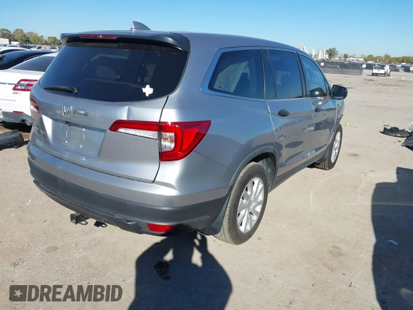 2019 Honda Pilot LX with VIN 5FNYF5H14KB029906, listed as a IAAI auction lot 40859425 with 77,920 mi miles. Bid and sale history available at carsss.com. Image 4.