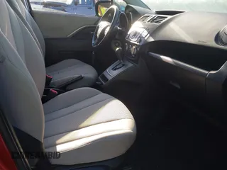 2014 Mazda Mazda5 Sport with VIN JM1CW2BLXE0163650, listed as a IAAI auction lot 42024762 with 137,314 mi miles. Bid and sale history available at carsss.com. Image 5.