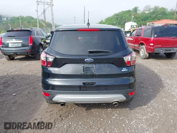 2017 Ford Escape SE with VIN 1FMCU9GD0HUC62616, listed as a IAAI auction lot 42194561 with 97,897 mi miles and . Bid and sale history available at DreamBid. Image 16.
