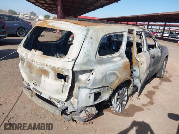 2015 Dodge Durango SXT with VIN 1C4RDJAG5FC240178, listed as a IAAI auction lot 41701443 with Not Provided miles and . Bid and sale history available at DreamBid. Image 4.