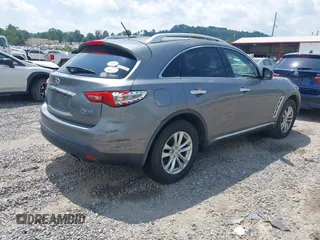 2014 Infiniti QX70 with VIN JN8CS1MW5EM411653, listed as a IAAI auction lot 42690935 with 110,806 mi miles and . Bid and sale history available at DreamBid. Image 4.