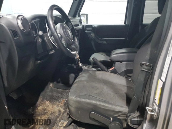 2015 Jeep Wrangler Unlimited Willys Wheeler with VIN 1C4BJWDGXFL503056, listed as a Copart auction lot 47191265 with Not Provided miles and Salvage Title. Bid and sale history available at DreamBid. Image 7.
