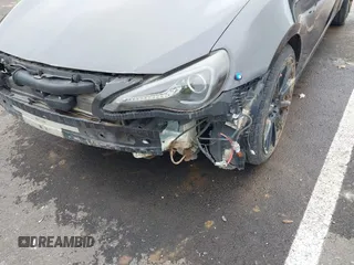 2015 Scion FR-S z VIN JF1ZNAA16F9710455, wystawiony jako IAAI lot #41838228 z przebiegiem 103 097 mil mil oraz . Historia ofert i sprzedaży dostępna na DreamBid. Obrazek 20.