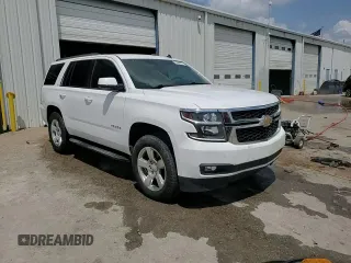 2015 Chevrolet Tahoe LT with VIN 1GNSCBKC8FR181394, listed as a Copart auction lot 53846435 with 191,875 mi miles and Salvage title. Bid and sale history available at DreamBid. Image 14.
