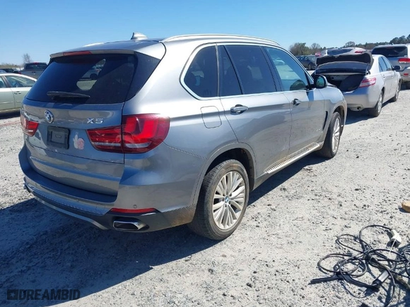 2016 BMW X5 eDrive xDrive40e with VIN 5UXKT0C50G0F75010, listed as a IAAI auction lot 41732410 with 88,671 mi miles. Bid and sale history available at carsss.com. Image 4.