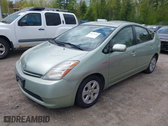 2007 Toyota Prius z VIN JTDKB20U277685606, wystawiony jako IAAI lot #42275241 z przebiegiem 291 225 mil mil oraz . Historia ofert i sprzedaży dostępna na DreamBid. Obrazek 2.