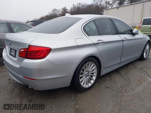 2013 BMW 5 Series 535i xDrive with VIN WBAFU7C56DDU66977, listed as a IAAI auction lot 41785161 with 88,919 mi miles and . Bid and sale history available at carsss.com. Image 4.