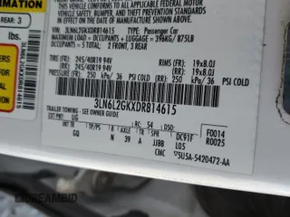 2013 Lincoln MKZ z VIN 3LN6L2GKXDR814615, wystawiony jako Copart lot #65654335 z przebiegiem 100 510 mil mil oraz Szkoda całkowita • Salvage title. Historia ofert i sprzedaży dostępna na DreamBid. Obrazek 12.
