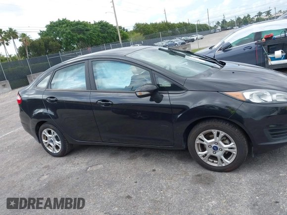 2015 Ford Fiesta SE with VIN 3FADP4BJ5FM130099, listed as a IAAI auction lot 42126960 with 82,299 mi miles and . Bid and sale history available at DreamBid. Image 13.