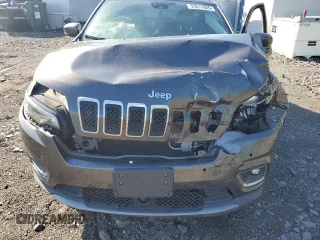 2019 Jeep Cherokee High Altitude with VIN 1C4PJMDX4KD133124, listed as a Copart auction lot 55817625 with 76,621 mi miles and Salvage title. Bid and sale history available at DreamBid. Image 12.