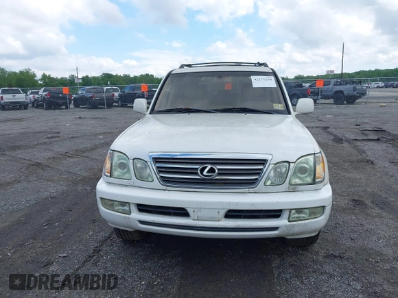 2001 Lexus LX 470 z VIN JTJHT00W613506010, wystawiony jako IAAI lot #42277268 z przebiegiem 186 671 mil mil oraz . Historia ofert i sprzedaży dostępna na DreamBid. Obrazek 12.