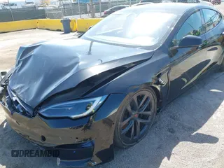 2022 Tesla Model S Plaid with VIN 5YJSA1E61NF483354, listed as a IAAI auction lot 41973636 with 32,541 mi miles and . Bid and sale history available at DreamBid. Image 19.
