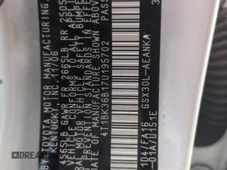 2007 Toyota Avalon XL z VIN 4T1BK36B17U195702, wystawiony jako Copart lot #58081355 z przebiegiem Nie podano mil oraz Szkoda całkowita • Salvage title. Historia ofert i sprzedaży dostępna na DreamBid. Obrazek 12.