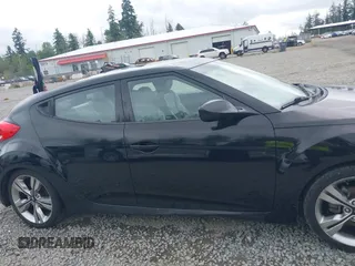 2012 Hyundai Veloster w/Gray Int with VIN KMHTC6AD4CU062034, listed as a IAAI auction lot 42371790 with 116,861 mi miles and . Bid and sale history available at DreamBid. Image 13.