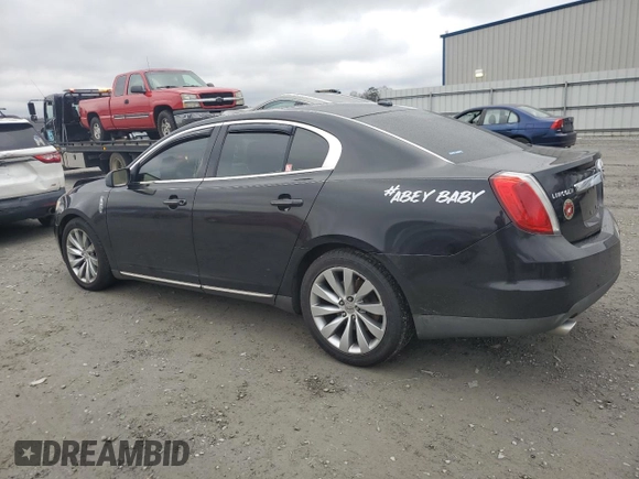 2012 Lincoln MKS with VIN 1LNHL9ER3CG806878, listed as a Copart auction lot 87162644 with 136,878 mi miles and Salvage Title. Bid and sale history available at DreamBid. Image 2.
