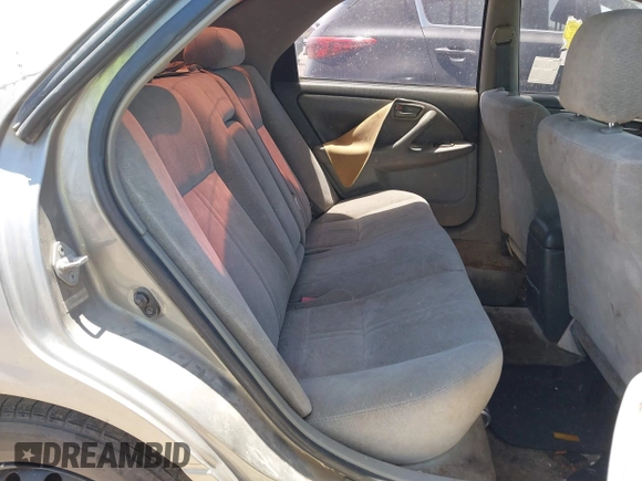 1998 Toyota Camry LE z VIN JT2BG22K8W0113985, wystawiony jako IAAI lot #42321418 z przebiegiem 277 270 mil mil oraz . Historia ofert i sprzedaży dostępna na DreamBid. Obrazek 8.