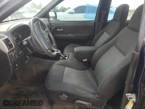 2007 GMC Canyon SLE1 with VIN 1GTCS139978239016, listed as a Copart auction lot 74303524 with 136,579 mi miles and Salvage Title. Bid and sale history available at carsss.com. Image 7.