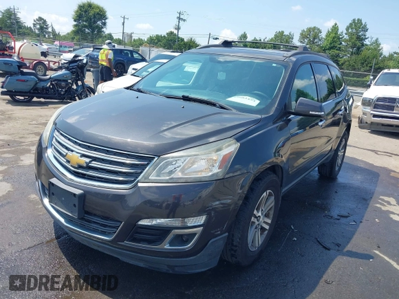 2015 Chevrolet Traverse LT with VIN 1GNKVHKD1FJ352801, listed as a IAAI auction lot 42603454 with 110,991 mi miles and . Bid and sale history available at DreamBid. Image 2.