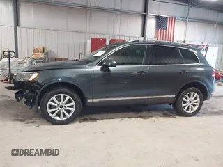 2013 Volkswagen Touareg Lux with VIN WVGEF9BP6DD007032, listed as a IAAI auction lot 41684721 with 147,249 mi miles and . Bid and sale history available at DreamBid. Image 15.