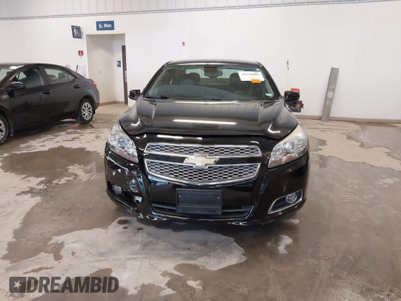 2013 Chevrolet Malibu LTZ with VIN 1G11H5SA1DU129095, listed as a IAAI auction lot 41556006 with 170,477 mi miles and . Bid and sale history available at DreamBid. Image 12.