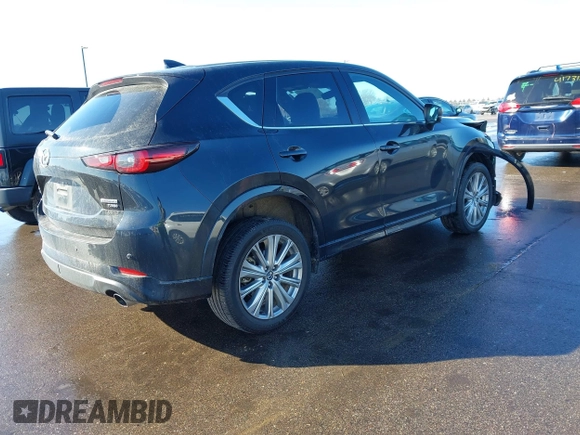 2023 Mazda CX-5 Signature with VIN JM3KFBXY2P0128644, listed as a IAAI auction lot 41753947 with 79,204 mi miles and . Bid and sale history available at carsss.com. Image 4.