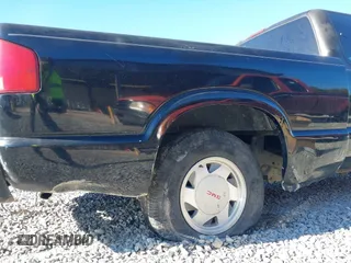 2003 GMC Sonoma z VIN 1GTCS19H138182562, wystawiony jako IAAI lot #41051512 z przebiegiem 212 117 mil mil oraz . Historia ofert i sprzedaży dostępna na DreamBid. Obrazek 6.