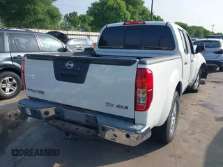 2015 Nissan Frontier Pro-4X with VIN 1N6AD0EV1FN717450, listed as a IAAI auction lot 41898172 with 141,739 mi miles and . Bid and sale history available at DreamBid. Image 4.