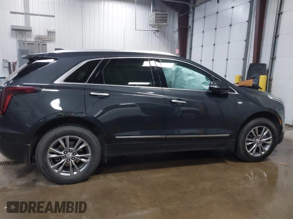 2023 Cadillac XT5 AWD Premium Luxury with VIN 1GYKNDRS2PZ122350, listed as a IAAI auction lot 42123718 with 17,971 mi miles and . Bid and sale history available at DreamBid. Image 13.