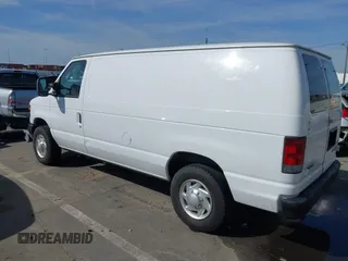 2009 Ford Econoline Cargo Commercial with VIN 1FTNE14W09DA62046, listed as a IAAI auction lot 41605647 with 100,622 mi miles and . Bid and sale history available at DreamBid. Image 3.