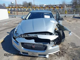 2017 Jaguar XE 25t Premium with VIN SAJAD4BG8HA976156, listed as a IAAI auction lot 41496861 with 83,824 mi miles. Bid and sale history available at carsss.com. Image 12.