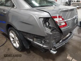 2013 Ford Taurus SEL with VIN 1FAHP2E86DG177504, listed as a IAAI auction lot 42071852 with 130,547 mi miles and . Bid and sale history available at carsss.com. Image 13.