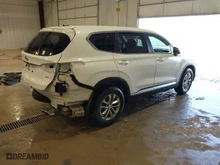 2019 Hyundai Santa Fe SE with VIN 5NMS2CAD4KH120957, listed as a IAAI auction lot 41937085 with 101,584 mi miles. Bid and sale history available at carsss.com. Image 4.