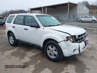 2010 Ford Escape XLS with VIN 1FMCU9C7XAKC89999, listed as a IAAI auction lot 41506494 with 242,078 mi miles and . Bid and sale history available at DreamBid. Image 1.