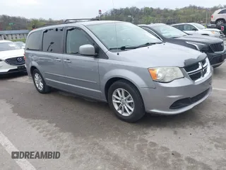 2014 Dodge Grand Caravan SXT with VIN 2C4RDGCG0ER417662, listed as a IAAI auction lot 41933279 with 156,751 mi miles and . Bid and sale history available at DreamBid. Image 1.