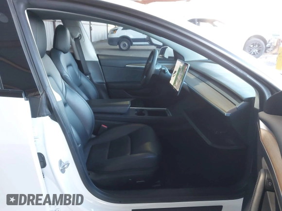 2021 Tesla Model 3 Performance with VIN 5YJ3E1EC4MF097993, listed as a IAAI auction lot 41366615 with 30,735 mi miles and . Bid and sale history available at DreamBid. Image 5.