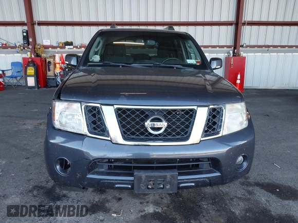 2011 Nissan Pathfinder LE z VIN 5N1AR1NB1BC616913, wystawiony jako IAAI lot #40627326 z przebiegiem 119 372 mil mil oraz . Historia ofert i sprzedaży dostępna na DreamBid. Obrazek 12.
