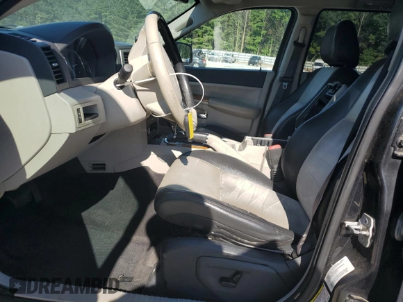 2010 Jeep Grand Cherokee Limited with VIN 1J4RR5GT8AC104045, listed as a Copart auction lot 65511775 with 230,582 mi miles and Clean title. Bid and sale history available at DreamBid. Image 7.