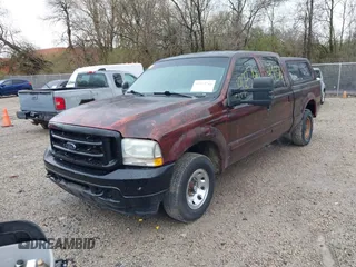 2004 Ford Super Duty F-250 XL with VIN 1FTNW20L34EA70689, listed as a IAAI auction lot 41923744 with 437,297 mi miles. Bid and sale history available at carsss.com. Image 2.