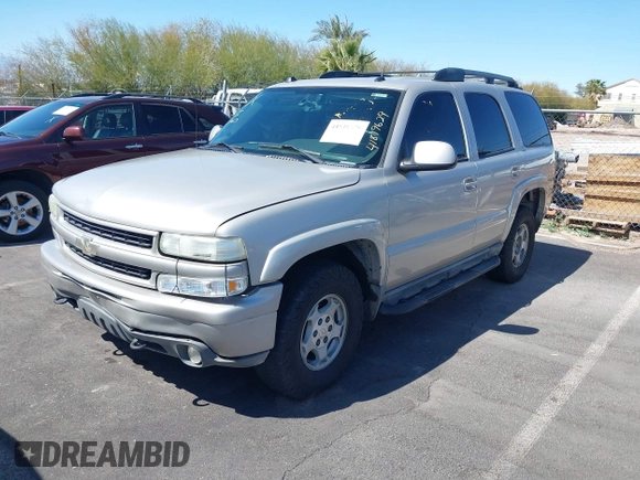 2005 Chevrolet Tahoe LT z VIN 1GNEK13T55R136601, wystawiony jako IAAI lot #41819629 z przebiegiem 220 074 mil mil oraz . Historia ofert i sprzedaży dostępna na DreamBid. Obrazek 2.