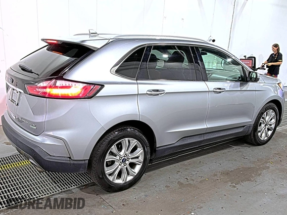 2020 Ford Edge Titanium with VIN 2FMPK3K95LBA30678, listed as a IAAI auction lot 42714178 with 60,935 mi miles and . Bid and sale history available at DreamBid. Image 24.