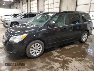 2014 Volkswagen Routan SE z VIN 2C4RVABG5ER135352, wystawiony jako Copart lot #51677515 z przebiegiem 136 833 mil mil oraz Czysty tytuł • Clean title. Historia ofert i sprzedaży dostępna na DreamBid. Obrazek 1.