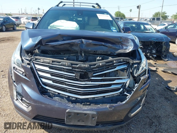 2018 Cadillac XT5 FWD with VIN 1GYKNARS7JZ206816, listed as a IAAI auction lot 42235546 with 94,125 mi miles and . Bid and sale history available at DreamBid. Image 12.