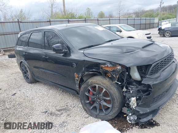2021 Dodge Durango SRT Hellcat with VIN 1C4SDJH91MC682235, listed as a IAAI auction lot 42029380 with 9,921 mi miles and . Bid and sale history available at DreamBid. Image 13.