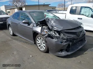 2020 Toyota Camry LE with VIN 4T1C11AK3LU363417, listed as a IAAI auction lot 41430382 with 130,837 mi miles. Bid and sale history available at carsss.com. Image 1.