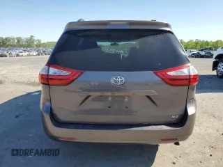 2016 Toyota Sienna XLE with VIN 5TDYK3DC6GS727718, listed as a Copart auction lot 54650605 with 90,380 mi miles and Salvage Title. Bid and sale history available at DreamBid. Image 6.