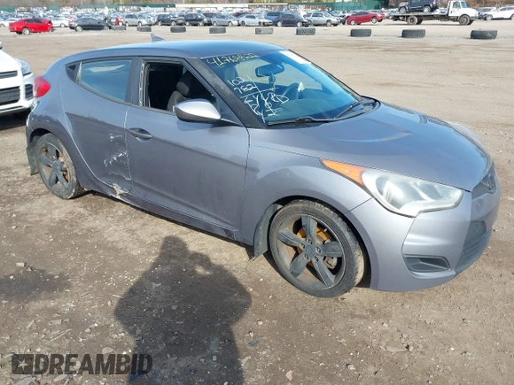 2013 Hyundai Veloster w/Black Int with VIN KMHTC6AD5DU172964, listed as a IAAI auction lot 41768827 with 102,782 mi miles and . Bid and sale history available at DreamBid. Image 1.